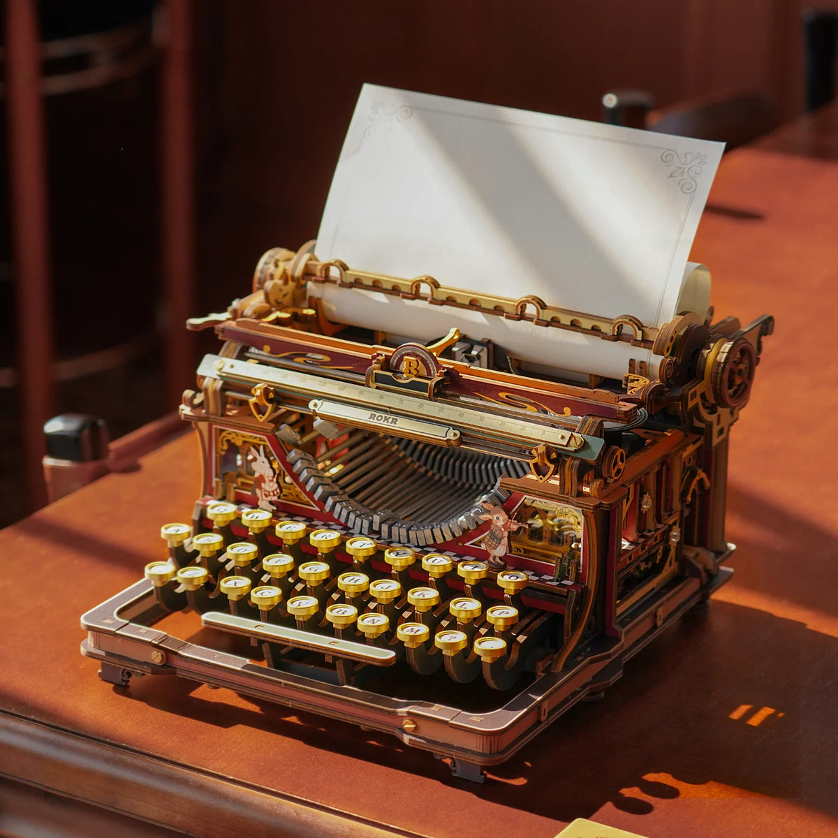 ROKR Magic Version typewriter displayed on a wooden desk — LK703Ce