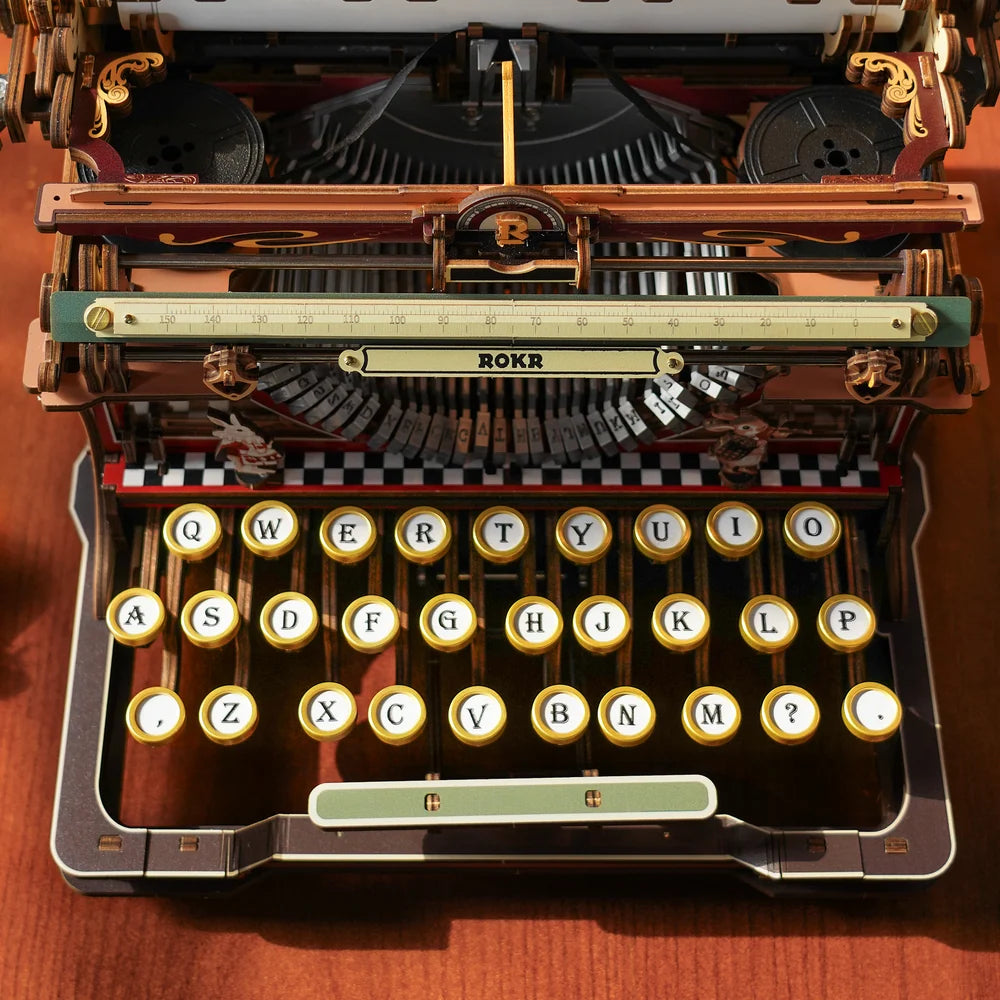 Top view of the ROKR typewriter keyboard, typebars and carriage — LK703Ce
